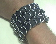 leather and maille braclets and riser cuffs